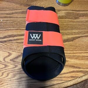 Large pair woof wear brushing boots
